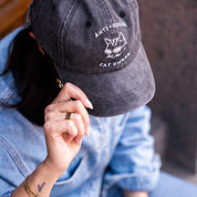 Sort denimkasket - logo "Anti-Social Cat Owner" 